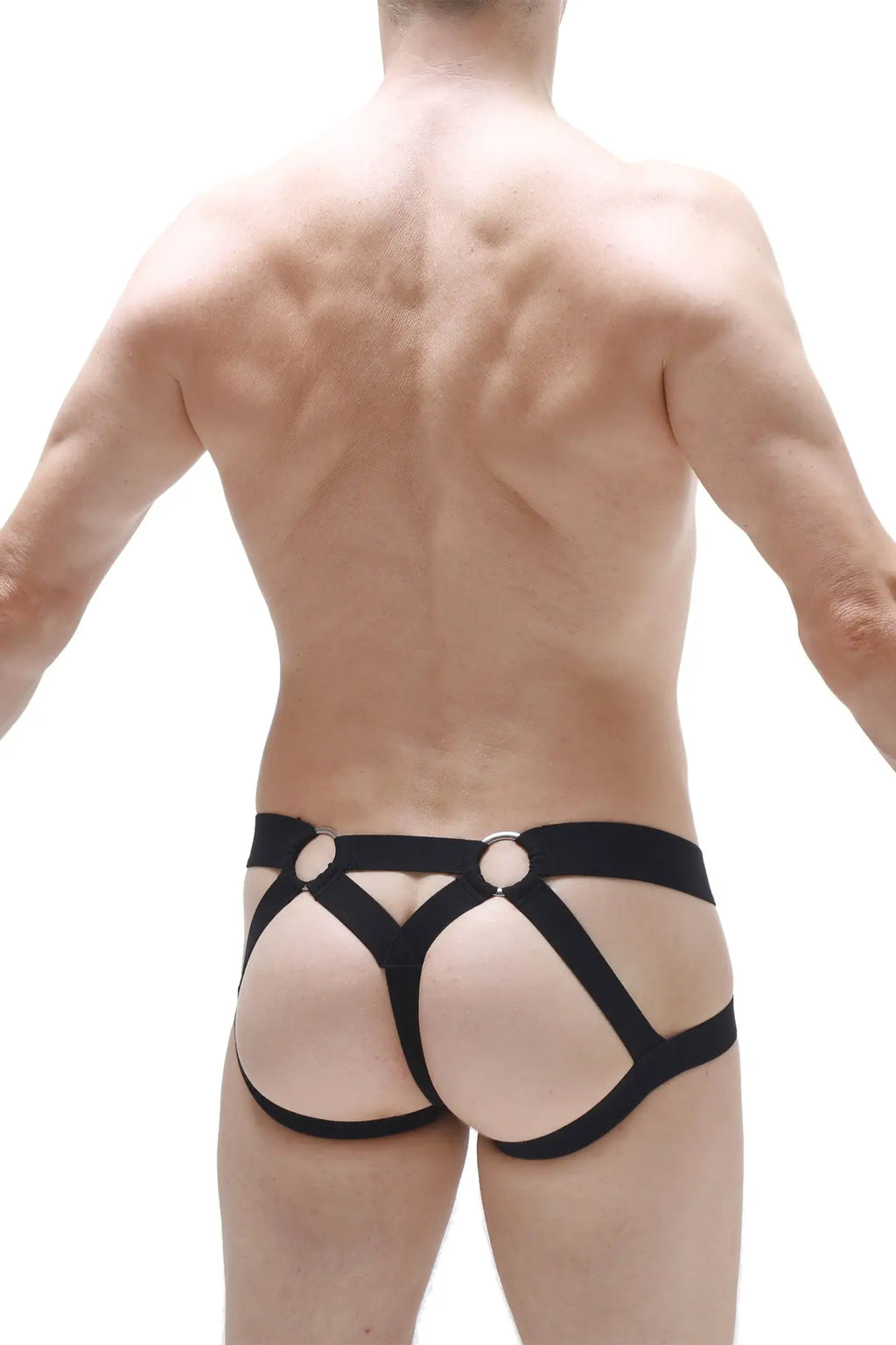Black leather-like harness-style briefs with circular metal rings at the back petitq jockstring brest black