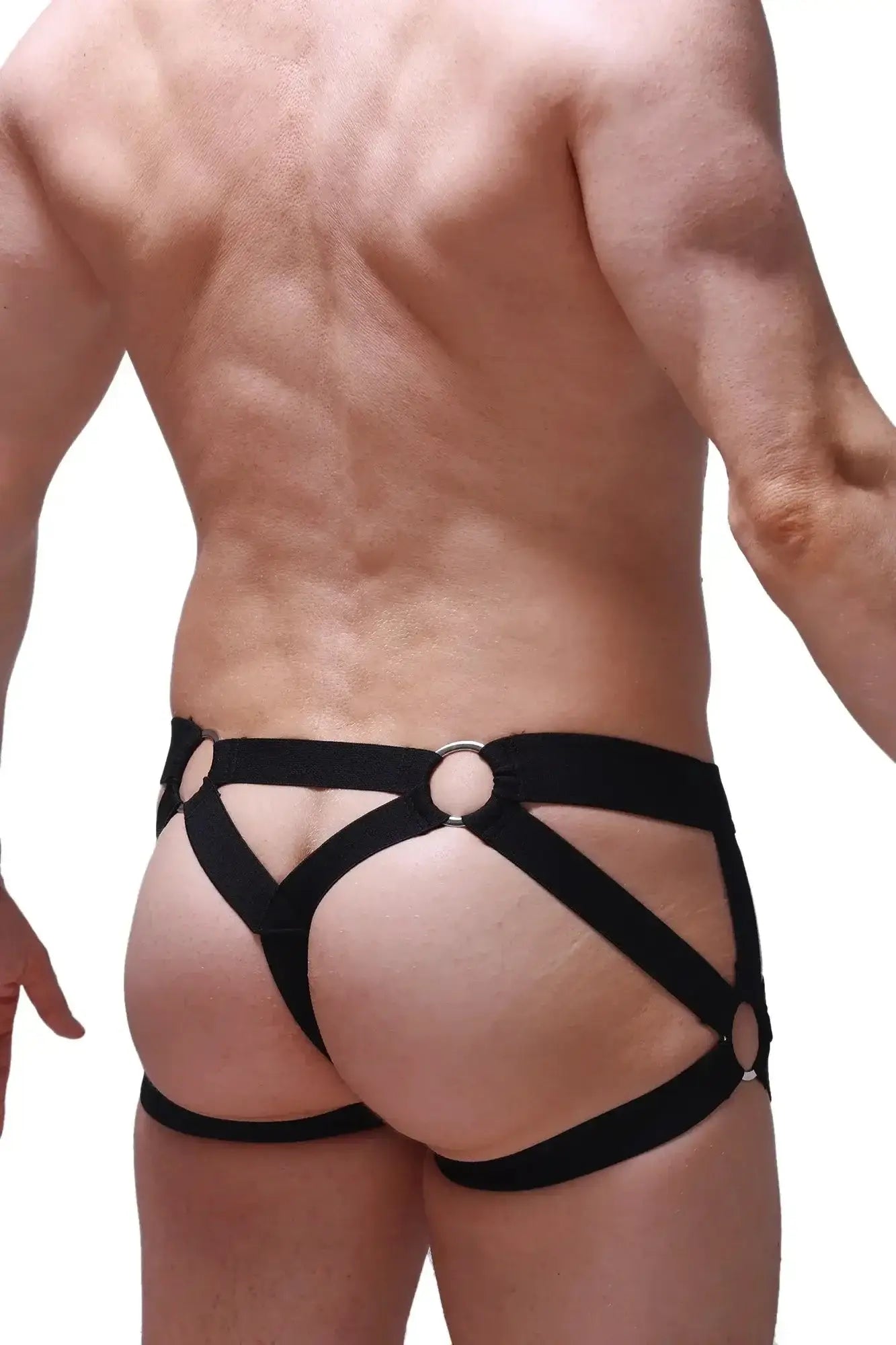Black leather harness-style briefs with silver metal rings from petitq jockstring bustic mesh black collection