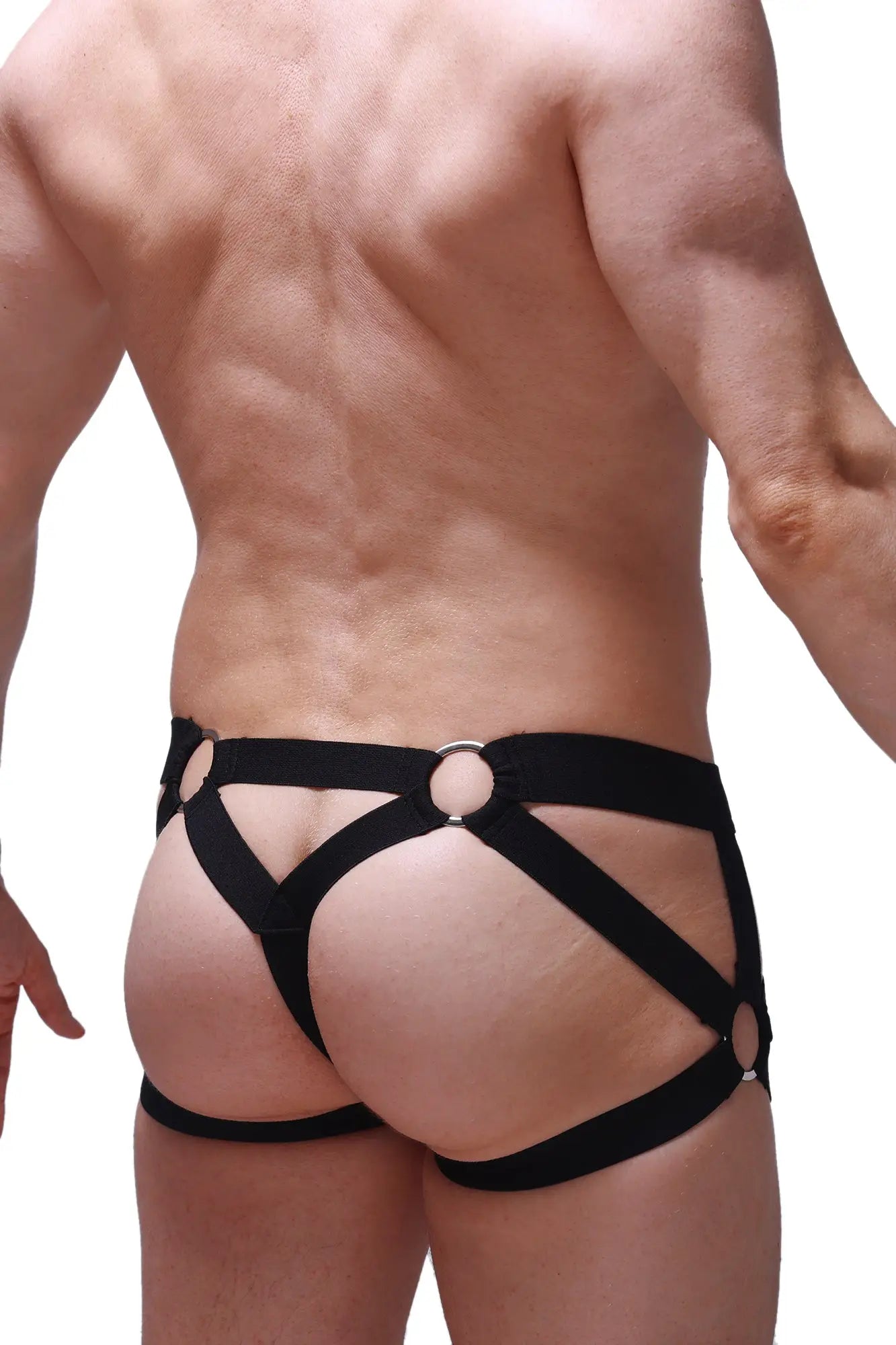 Black leather harness-style briefs with silver metal rings from petitq jockstring bustic mesh black collection