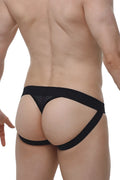 Black lace-trimmed petitq jockstring macra briefs with solid black waistband and leg straps visible from the front