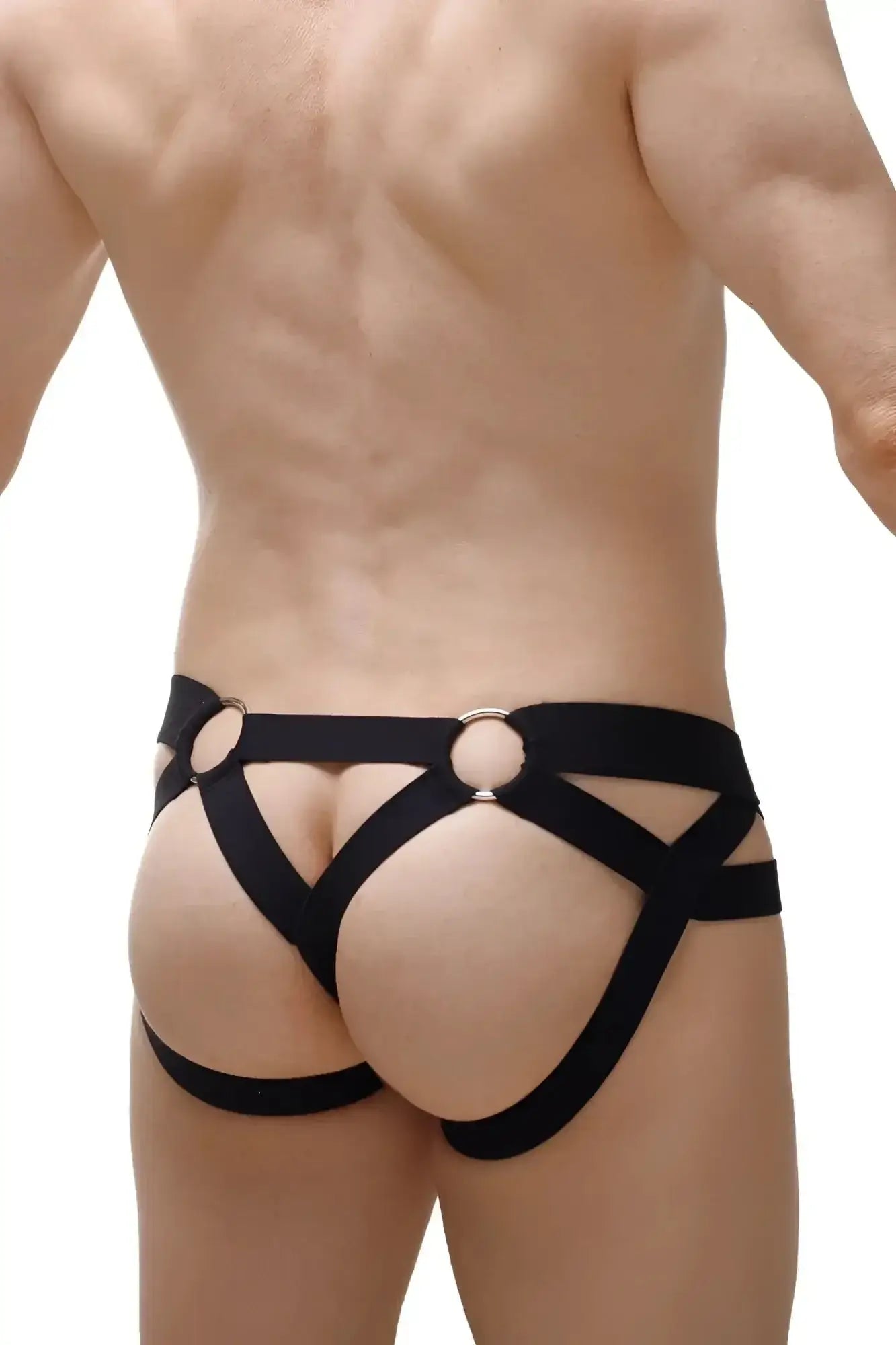Black leather harness style briefs with silver toned metal rings from petitq jockthong bost black collection