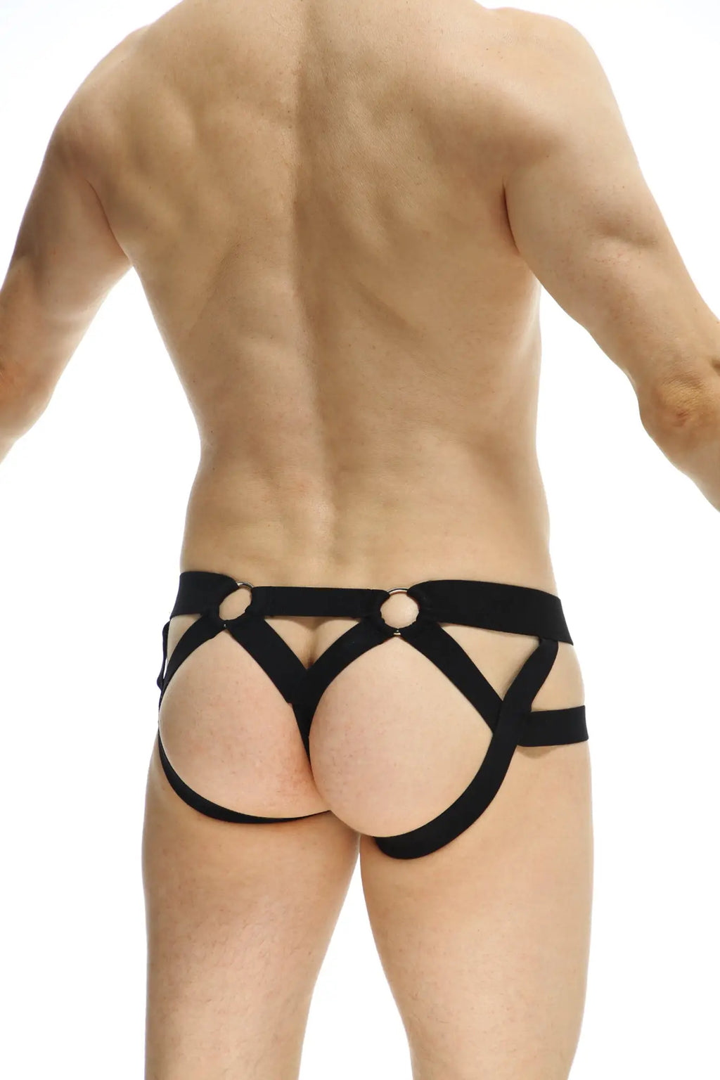 PetitQ JockThong Rider Bost black strappy harness underwear with crisscross design and metal rings at the front