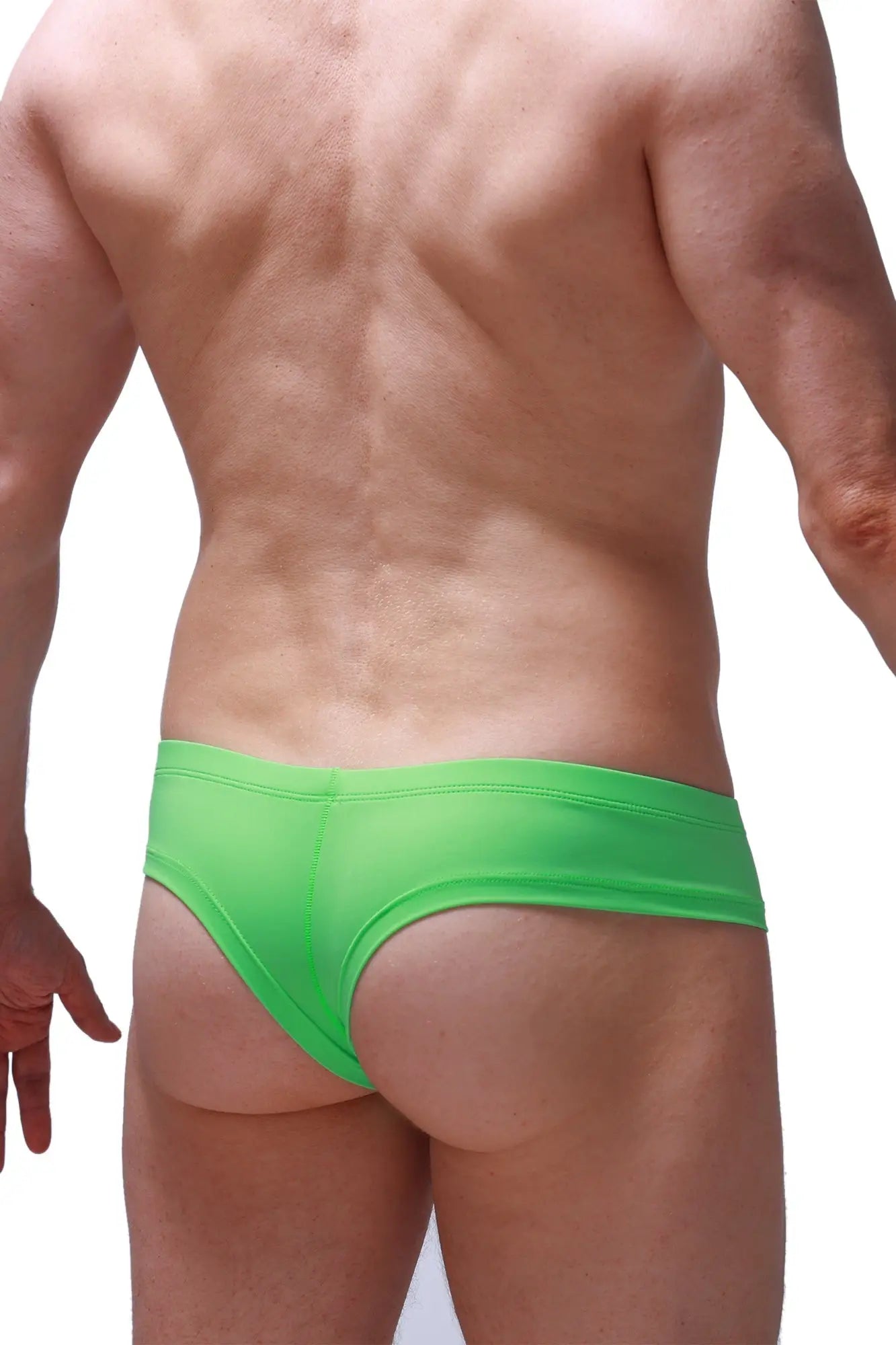 Petitq mini boxer neon green bright green form-fitting swim trunks with smooth stretchy fabric and low-rise cut
