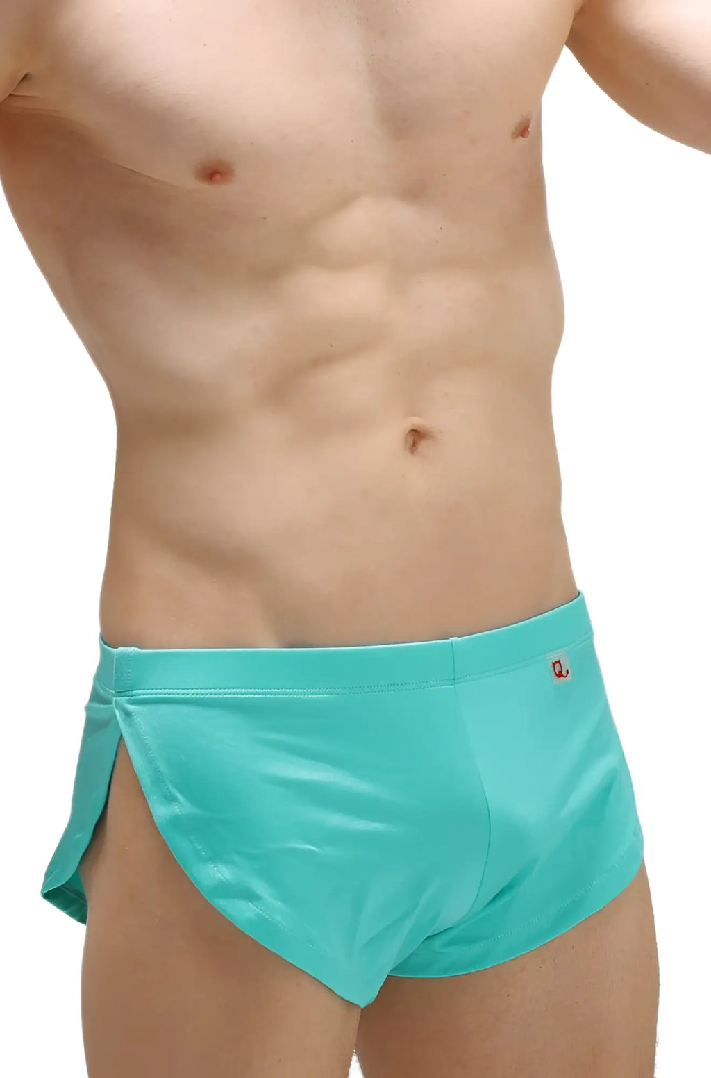 PetitQ running shorts Joe Green turquoise swim trunks with side slit and small red logo on waistband in front view