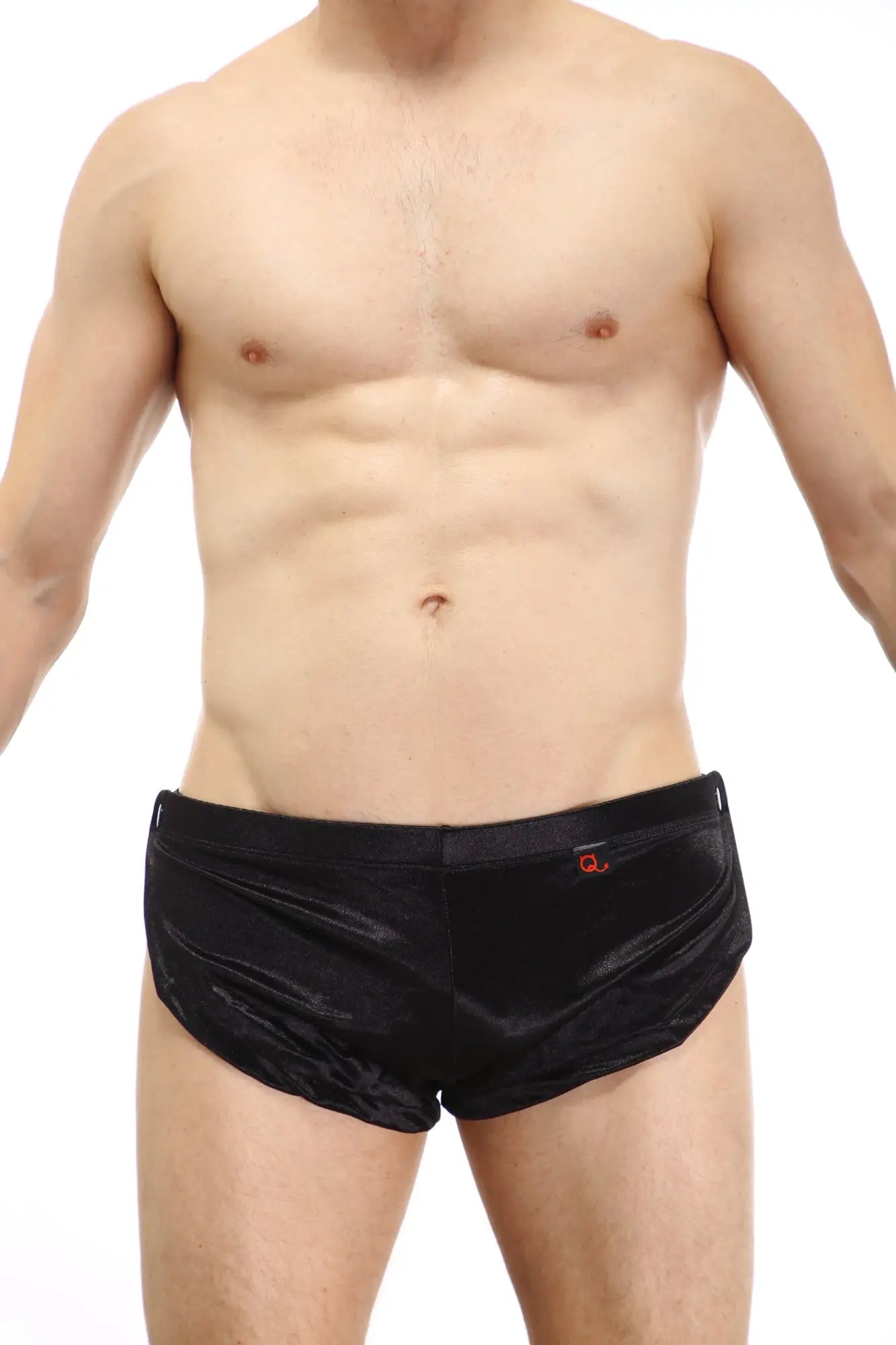 PetitQ shorts snap satin black swim trunks in black satin with a subtle sheen and small red logo on the waistband