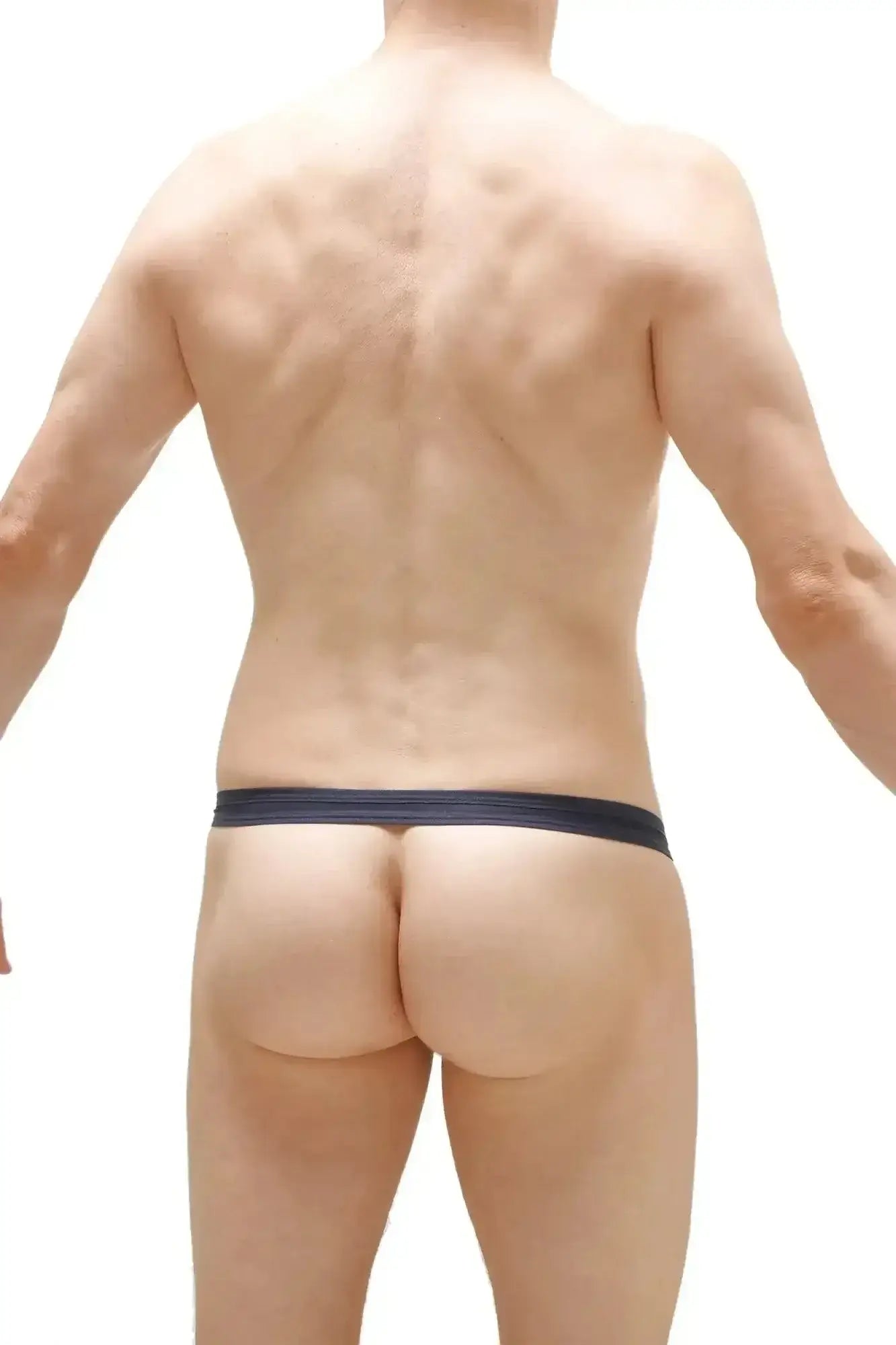 Navy blue thong with smooth elastic waistband by petitq slingshot lasso showing the back side of the product