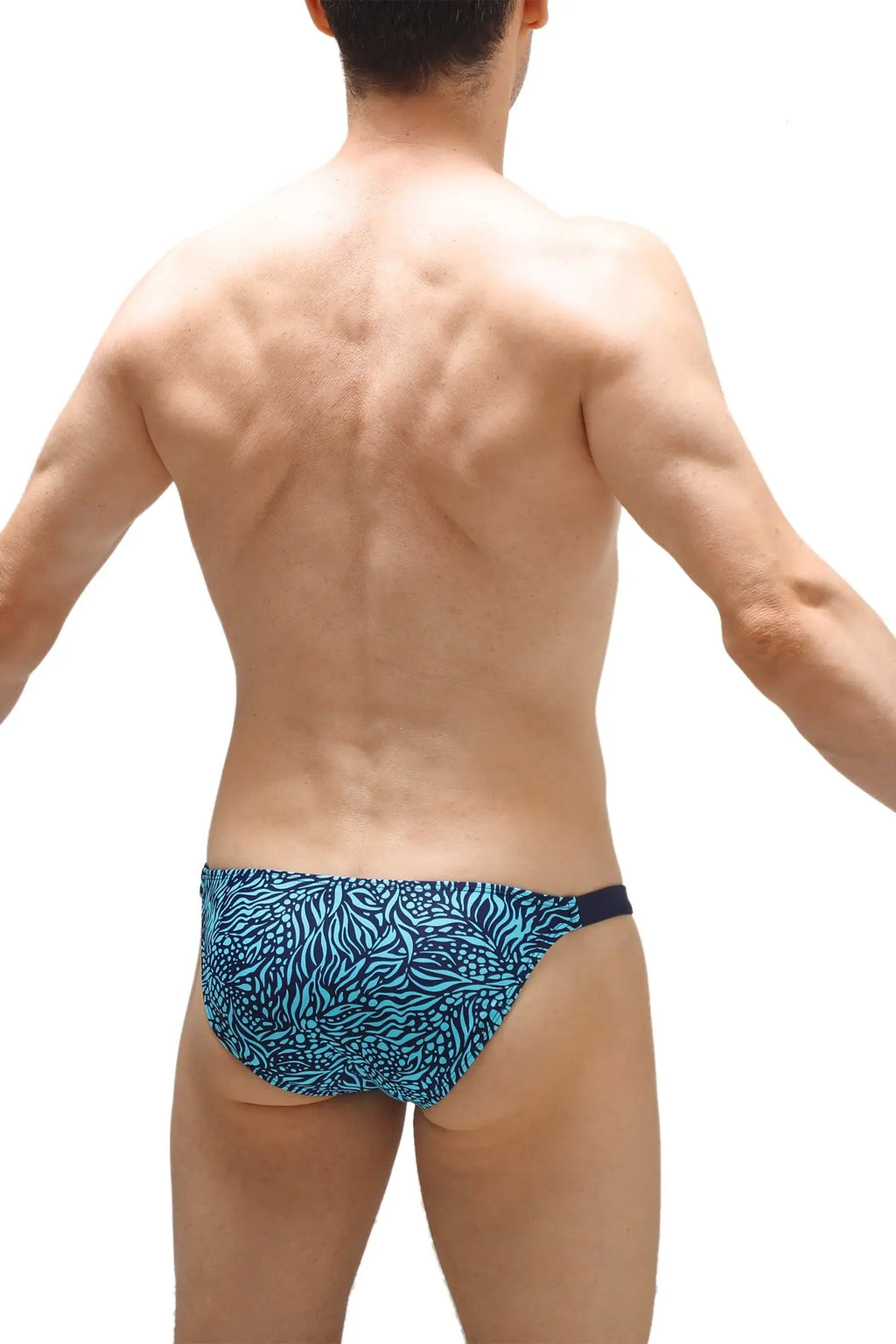 Blue patterned swim trunks with black waistband from petitq swim bikini objat mana for beach and pool use