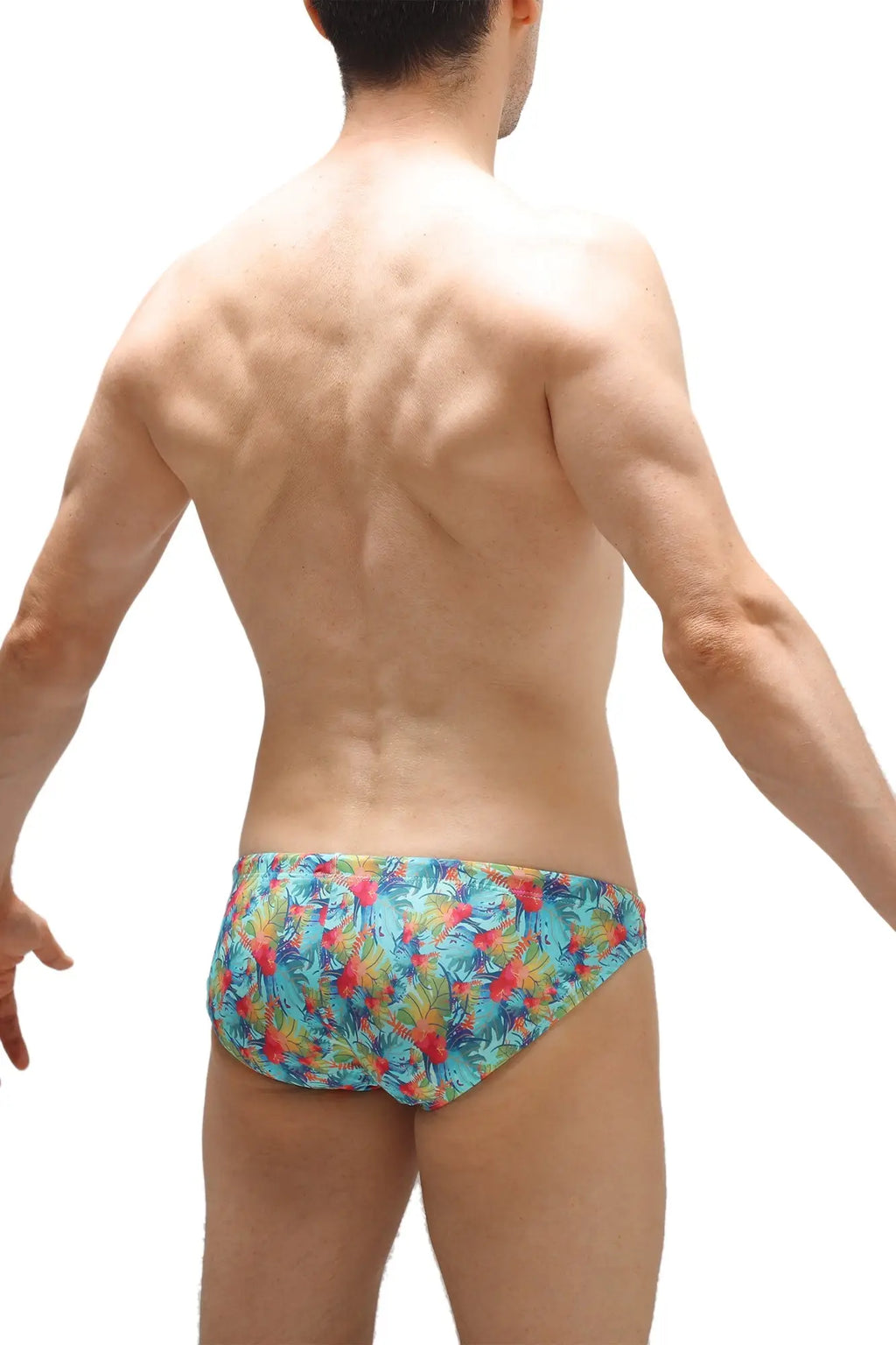 Petitq swim bikini taik canot brightly colored tropical print swim trunks in turquoise red and green