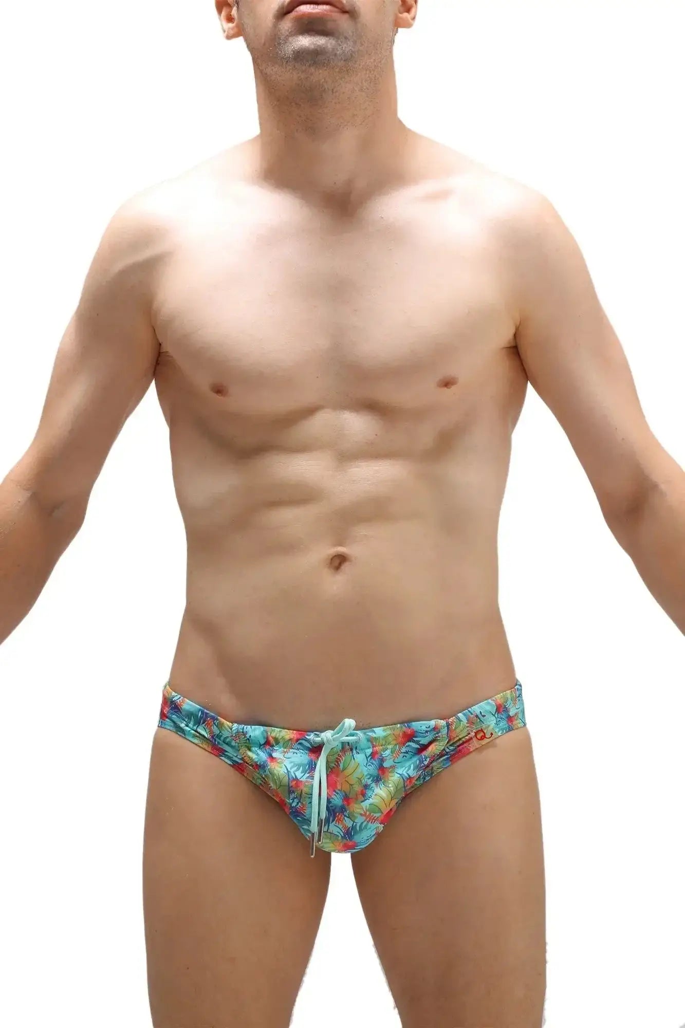 Men’s petitq swim bikini taik canot tropical print swim trunks in vibrant turquoise red and green with drawstring waistband