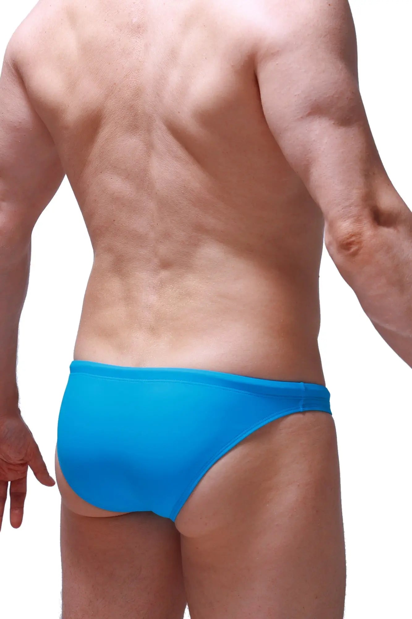 Bright blue petitq swim brief pauliat in smooth form-fitting fabric designed for comfortable swimming