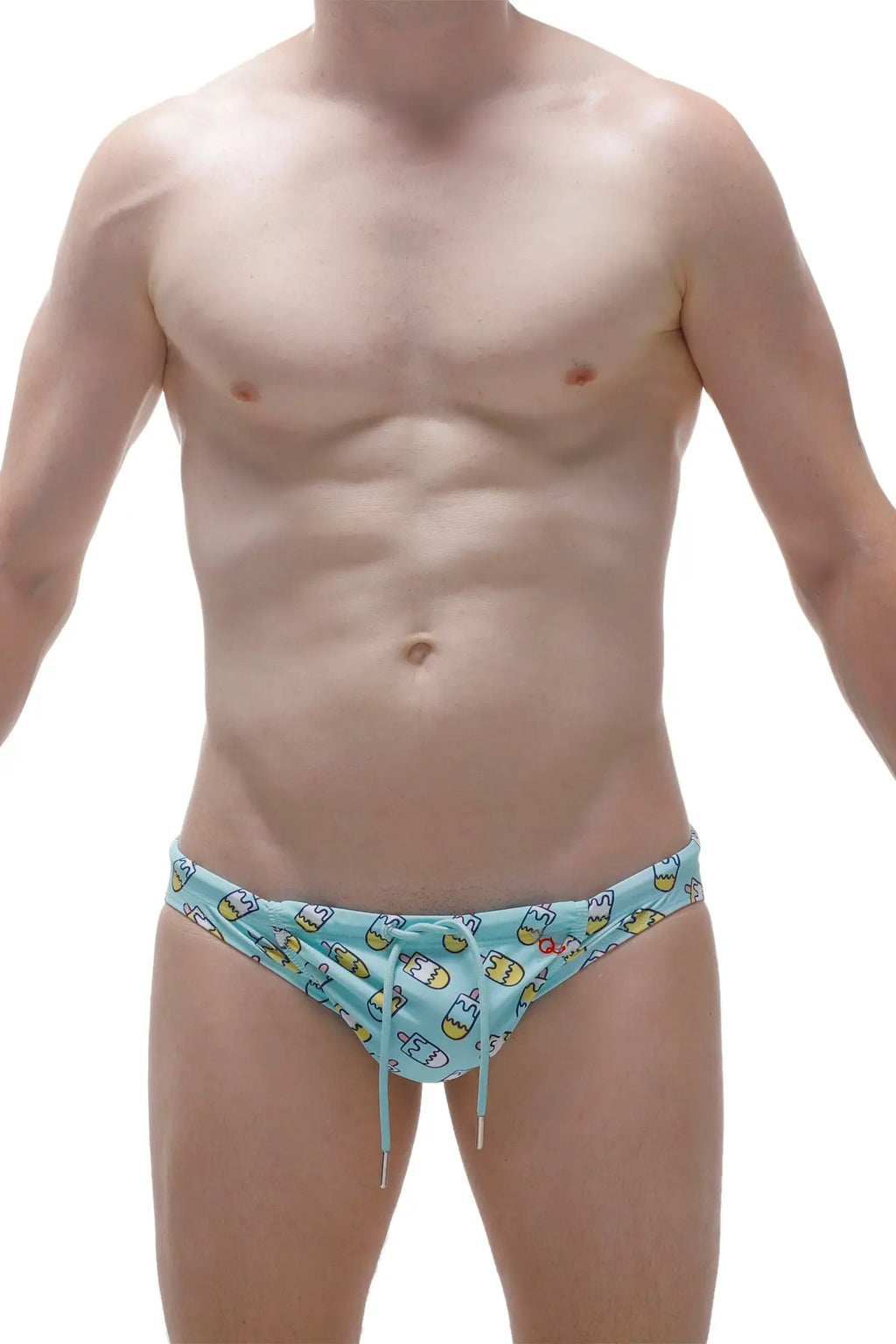 Light blue PetitQ swim brief featuring playful cartoon characters and yellow accents for fun swimwear