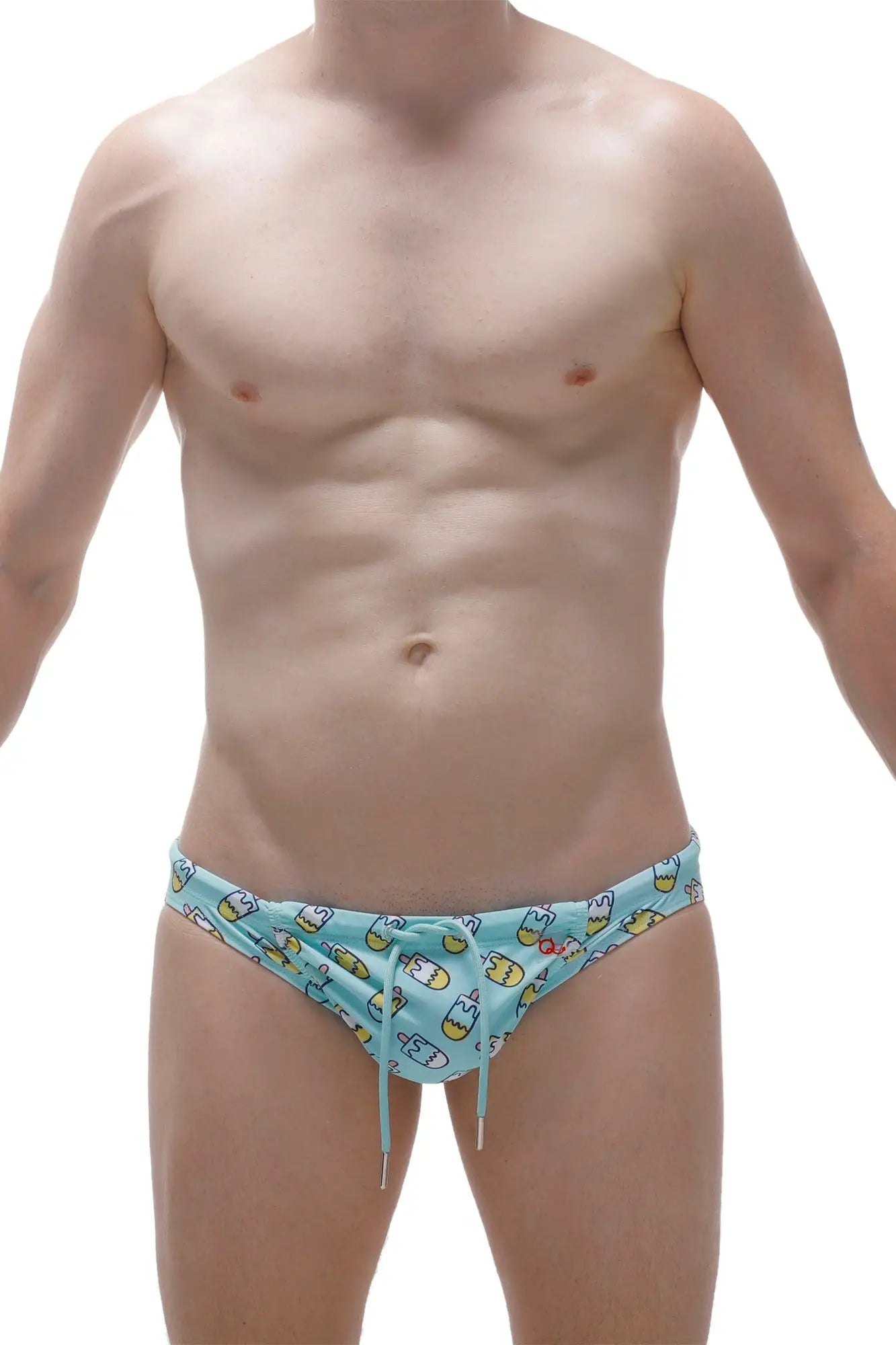 Light blue PetitQ swim brief featuring playful cartoon characters and yellow accents for fun swimwear