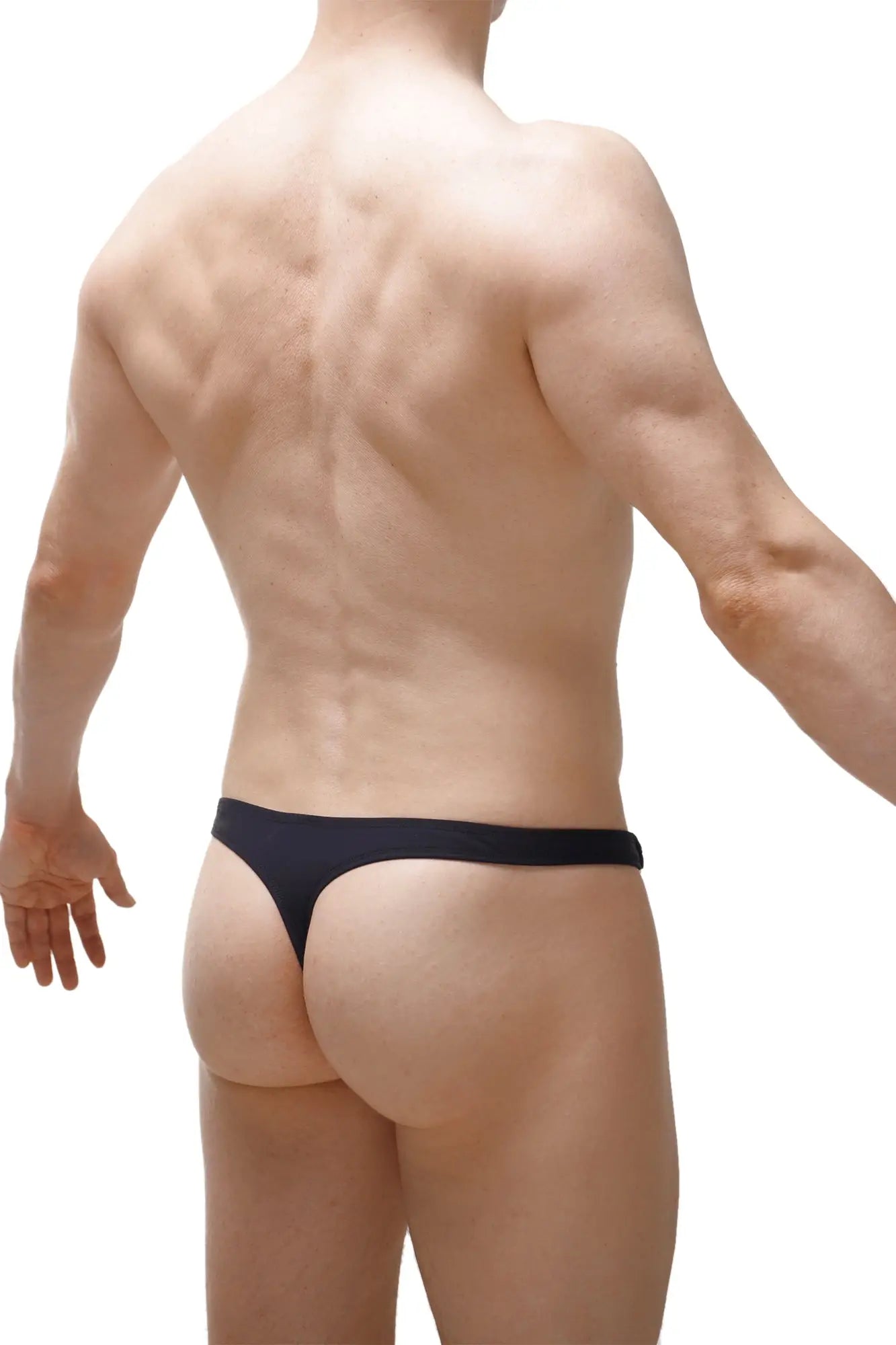 Black petitq swim thong made from recycled material shown from the back side for eco-friendly beachwear
