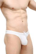 White cotton briefs with tied waistband from petitq swim thong econyl white showing front side