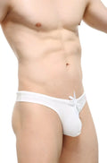 White cotton briefs with tied waistband from petitq swim thong econyl white showing front side