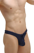 Navy blue PetitQ swim thong made from recycled material with a front drawstring tie and small side logo