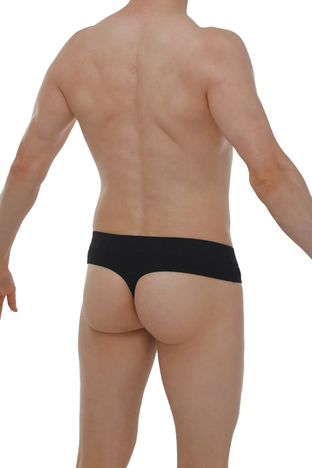Black seamless briefs with smooth fabric finish by petitq thong anjouin showing front view