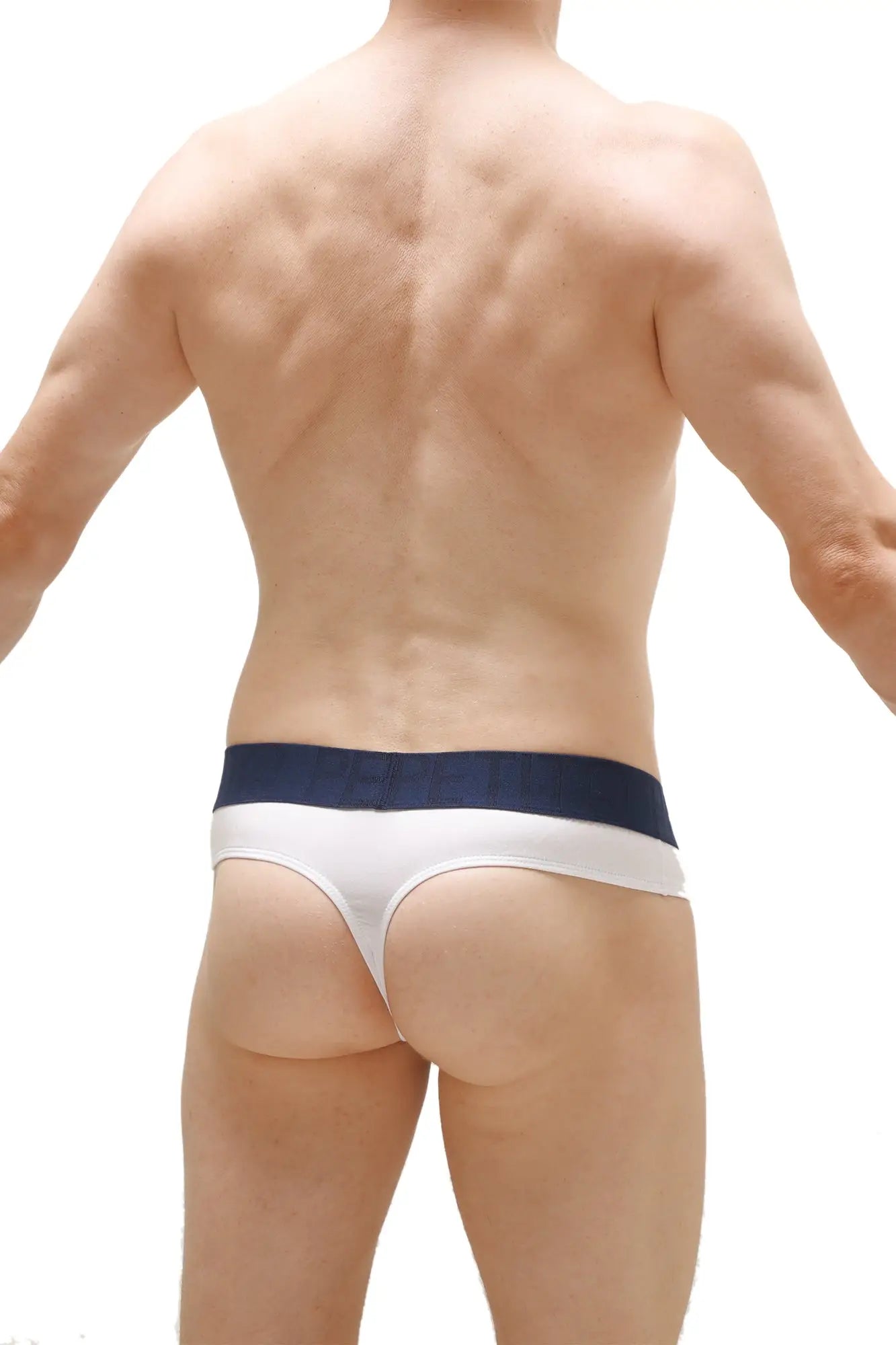 PetitQ thong Anjouin white in white and navy blue with a wide waistband showing front side design