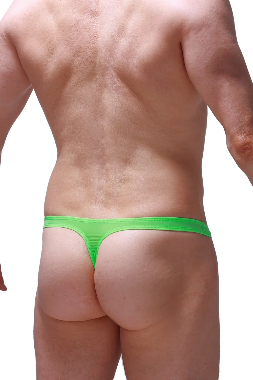 Bright neon green PetitQ thong made of stretchy fabric with a sleek design shown from the back side