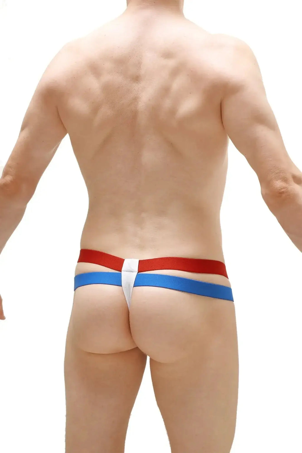Petitq thong barro white featuring red and blue striped sides with a white central panel for stylish comfort