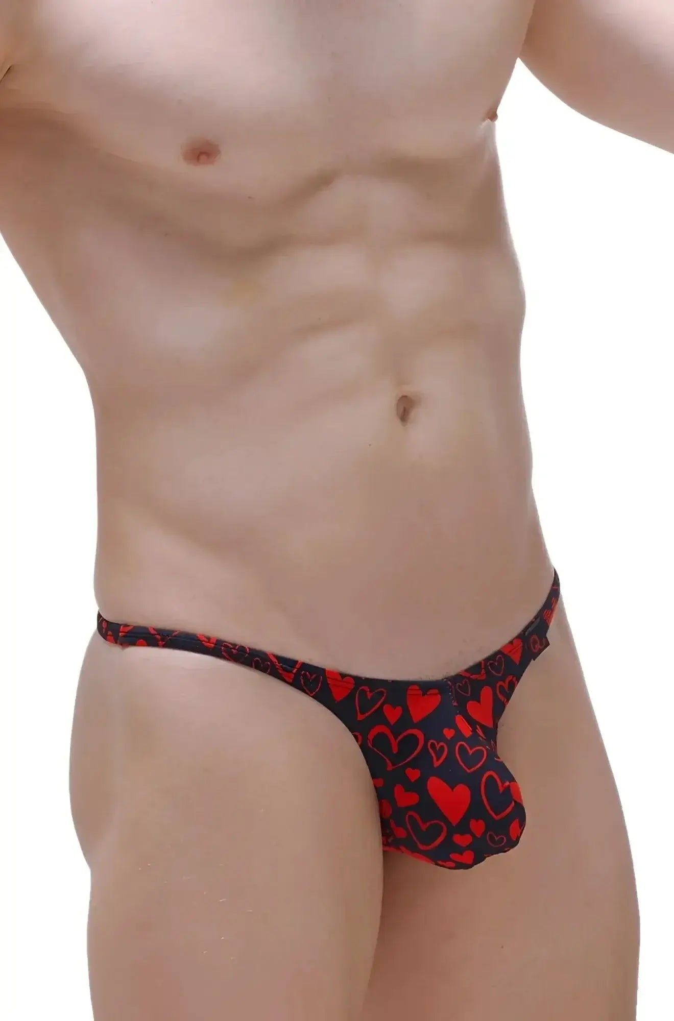 Black thong with red heart pattern by petitq bram king of hearts showing the back side of the lingerie