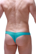 Petitq thong bulan green teal form-fitting thong with ruched back design shown from the back side