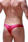 Back view of petitq thong bulan joe framboise bright red satin briefs with ruched back design