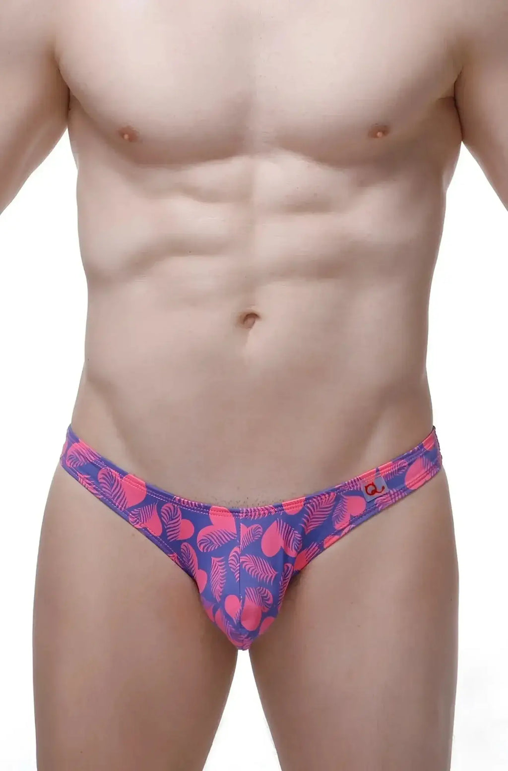 PetitQ thong Bulan tropical hearts men’s briefs in vibrant pink and purple with a heart pattern and snug fit
