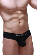 Black petitq thong briefs in dome modal fabric with sleek form fitting design and white logo branding visible front side