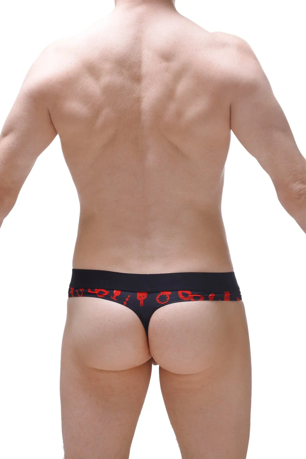 Black petitq thong with red symbolic patterns along the waistband designed as a boudoir cockring accessory