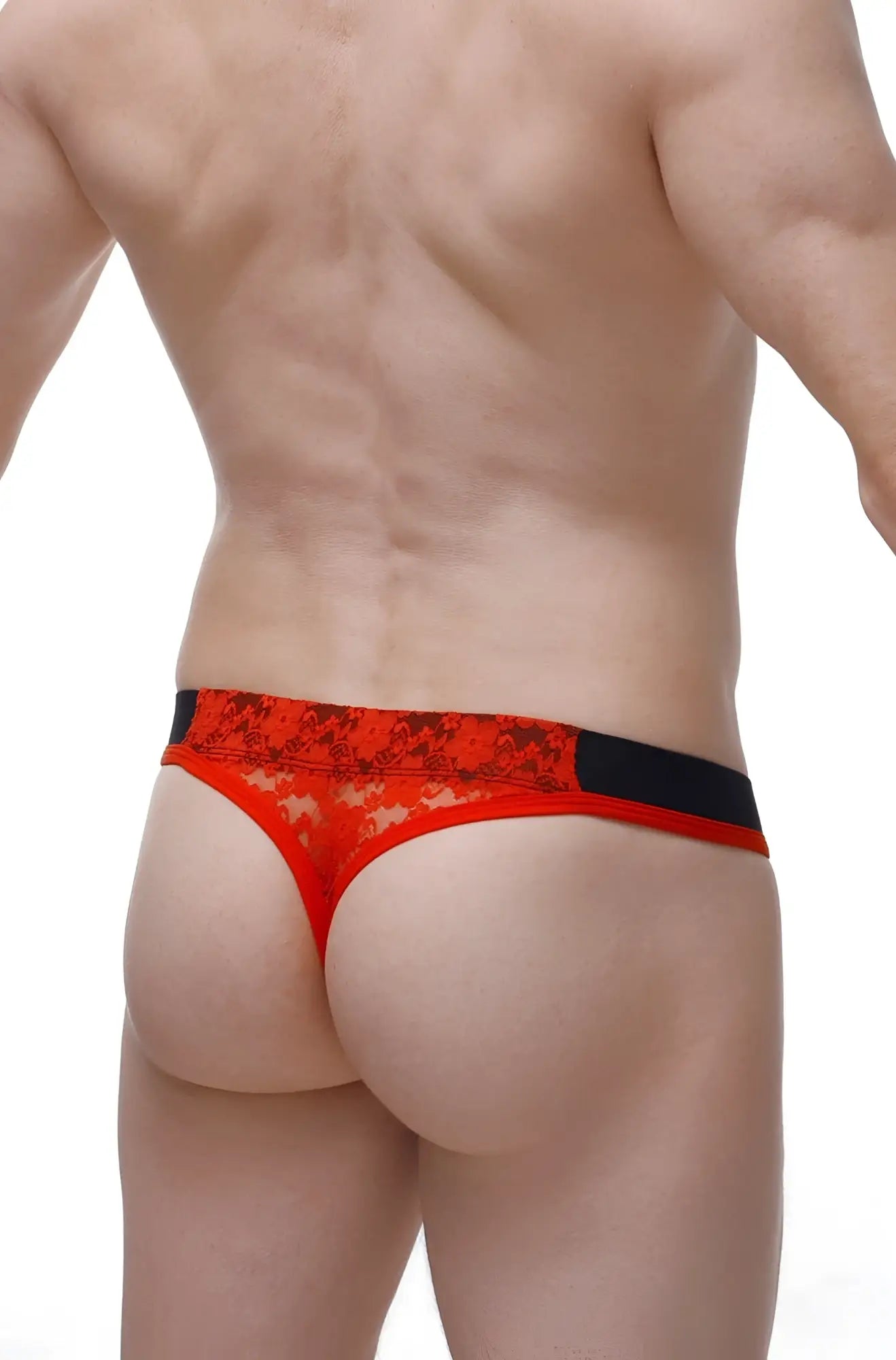 Red lace thong with black trim by petitq featuring delicate lace material and a bold red color design