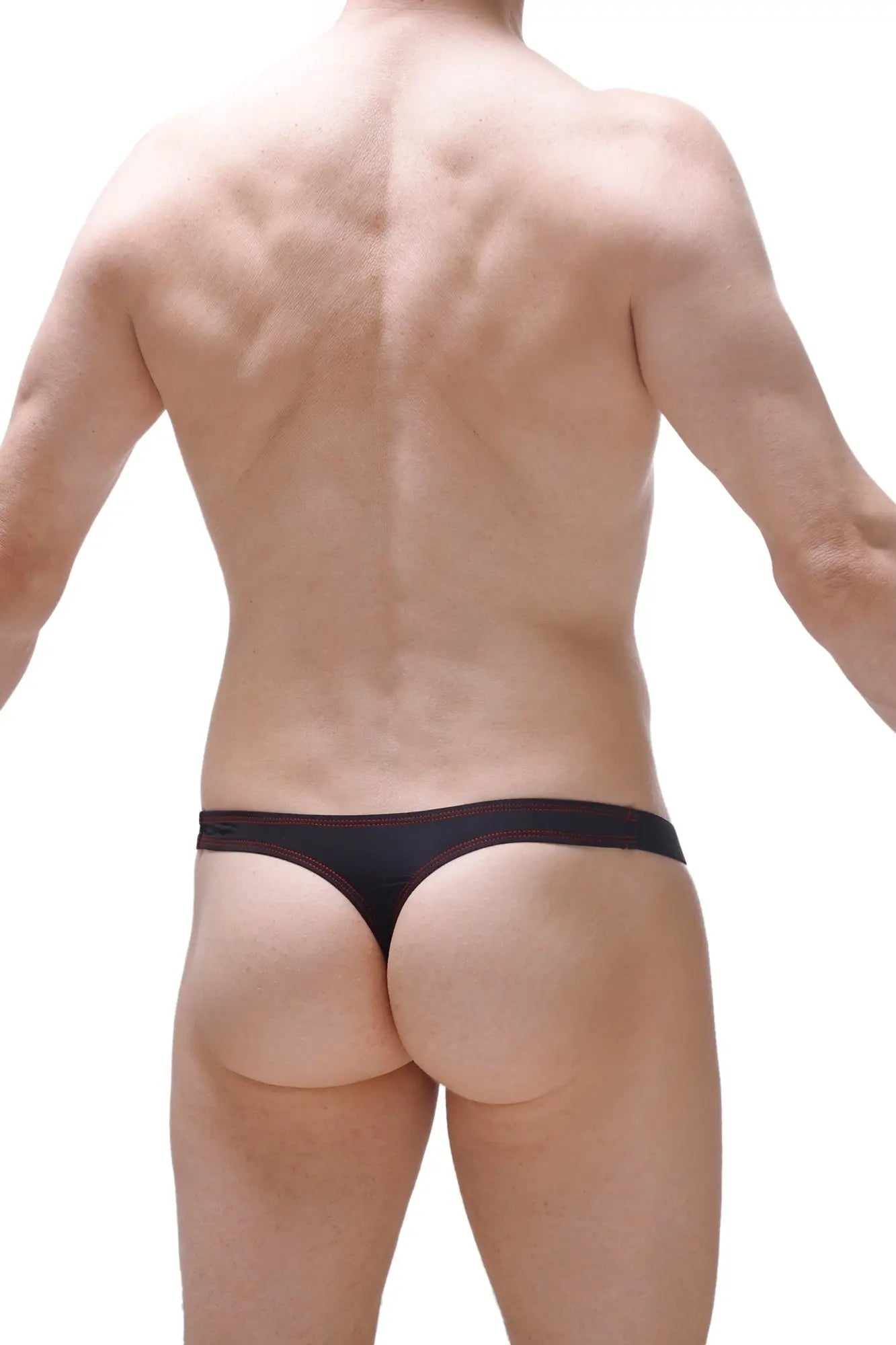 Black thong with red stitching along the waistband from PetitQ Mothern collection showing front view