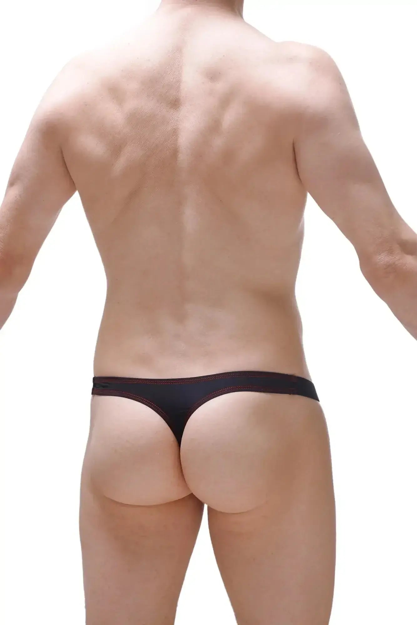 Black thong with red stitching along the waistband from PetitQ Mothern collection showing front view