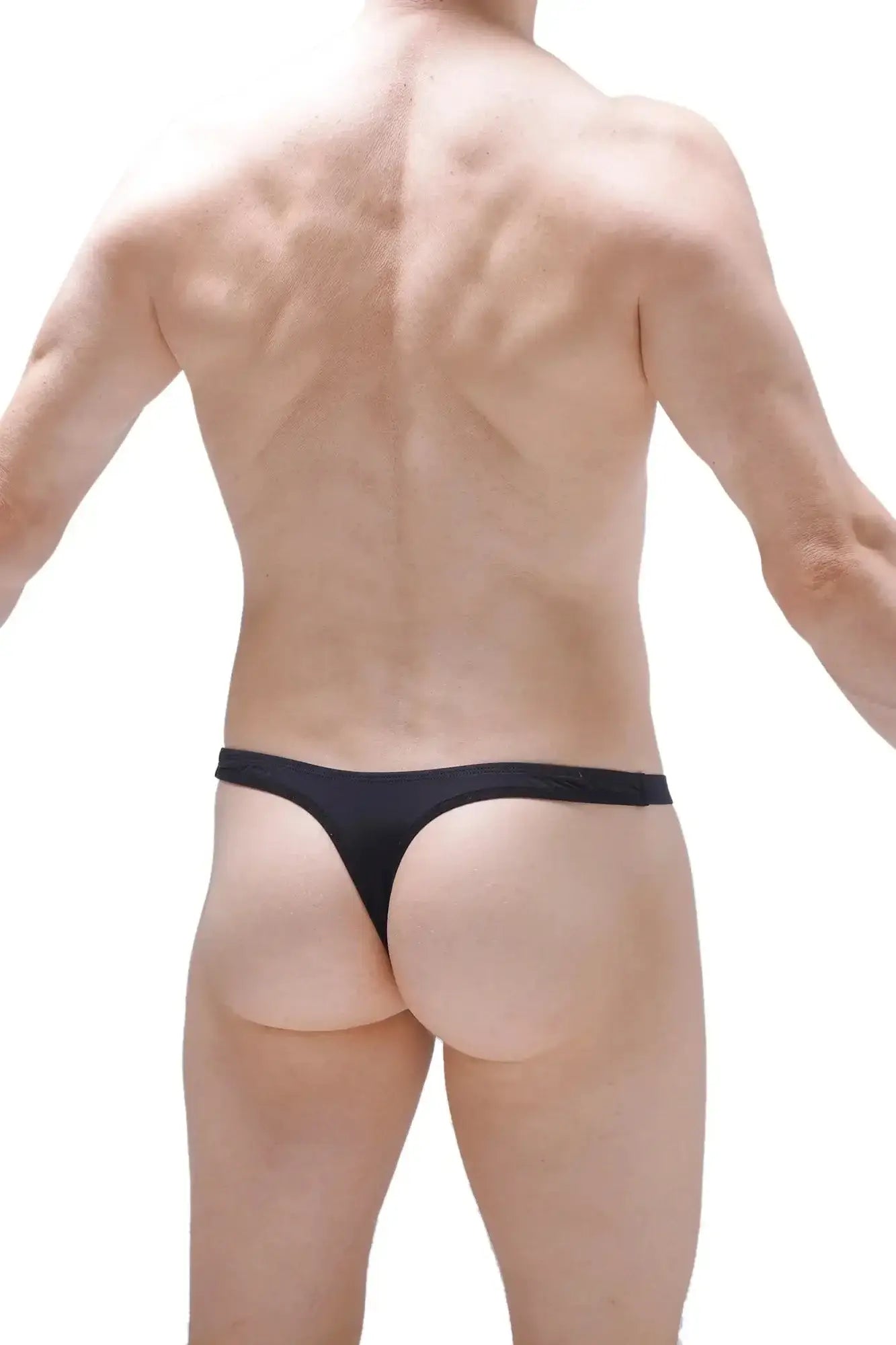 Black PetitQ thong underwear with smooth, form-fitting design shown from the back side