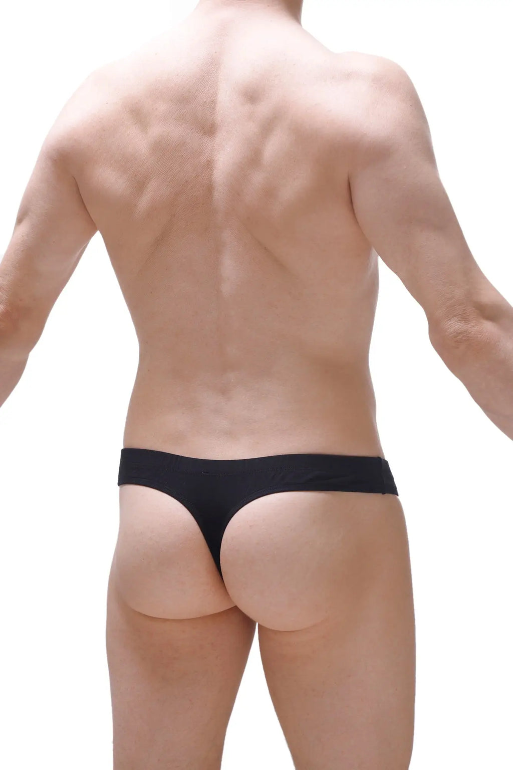 Black thong underwear petitq thong pensal black made of soft fabric shown from the back side