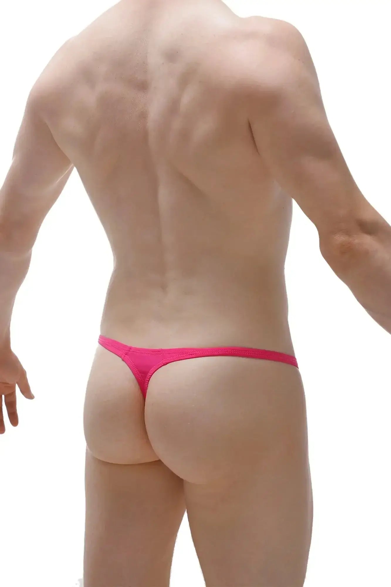 PetitQ thong plellis pink bright pink form-fitting thong made of stretchy fabric showing the back side of the product