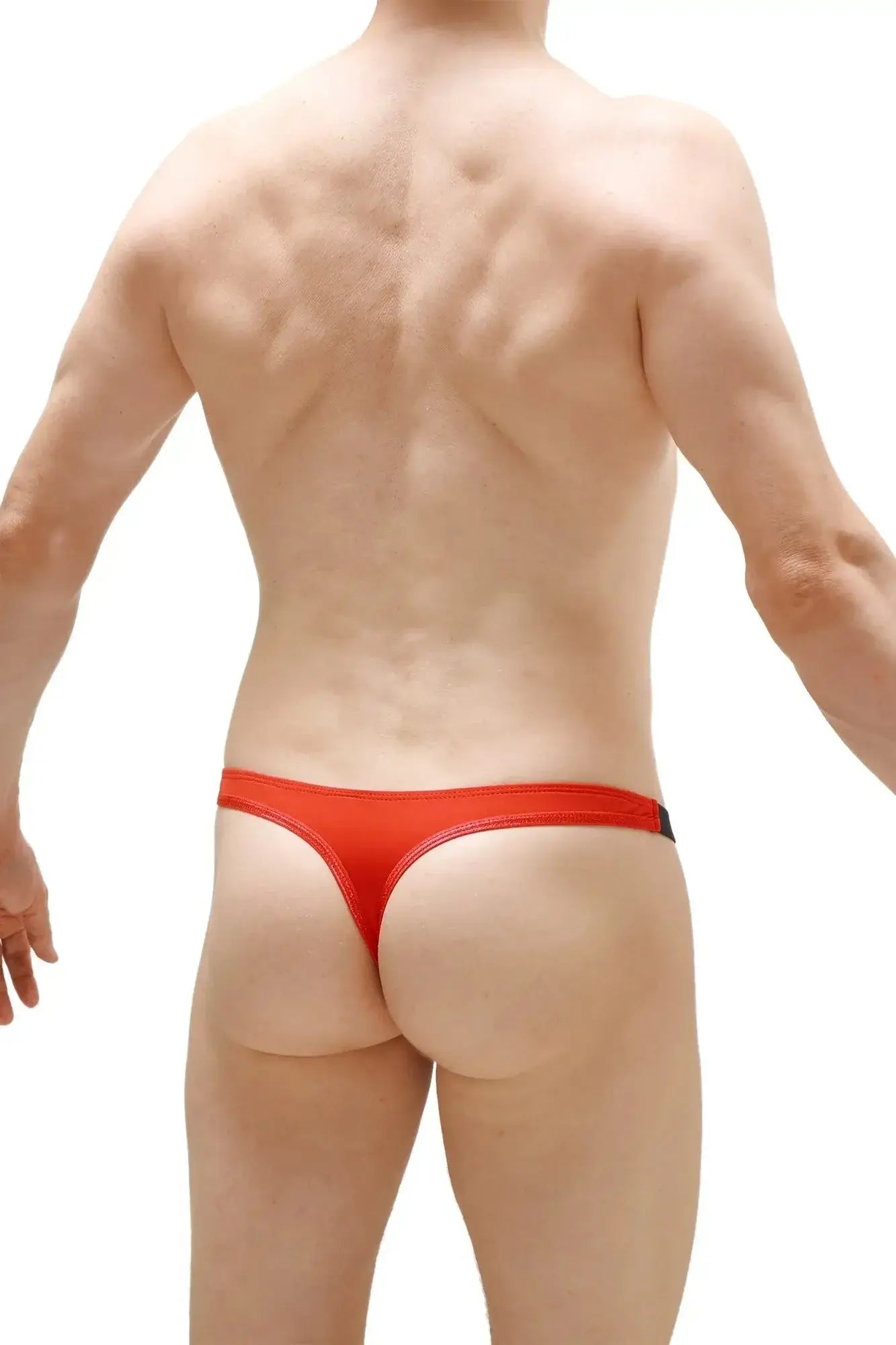 Petitq thong torp open red bright red form-fitting thong with sleek black trim along the waistband front view