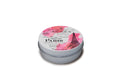 A round silver metal tin containing a petits joujoux parisian pink labeled massage candle 43ml