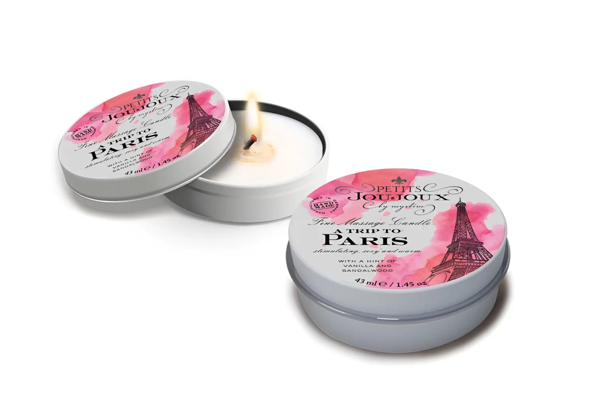 White scented petits joujoux massage candle in a silver tin with pink and black paris-themed labeling 43ml