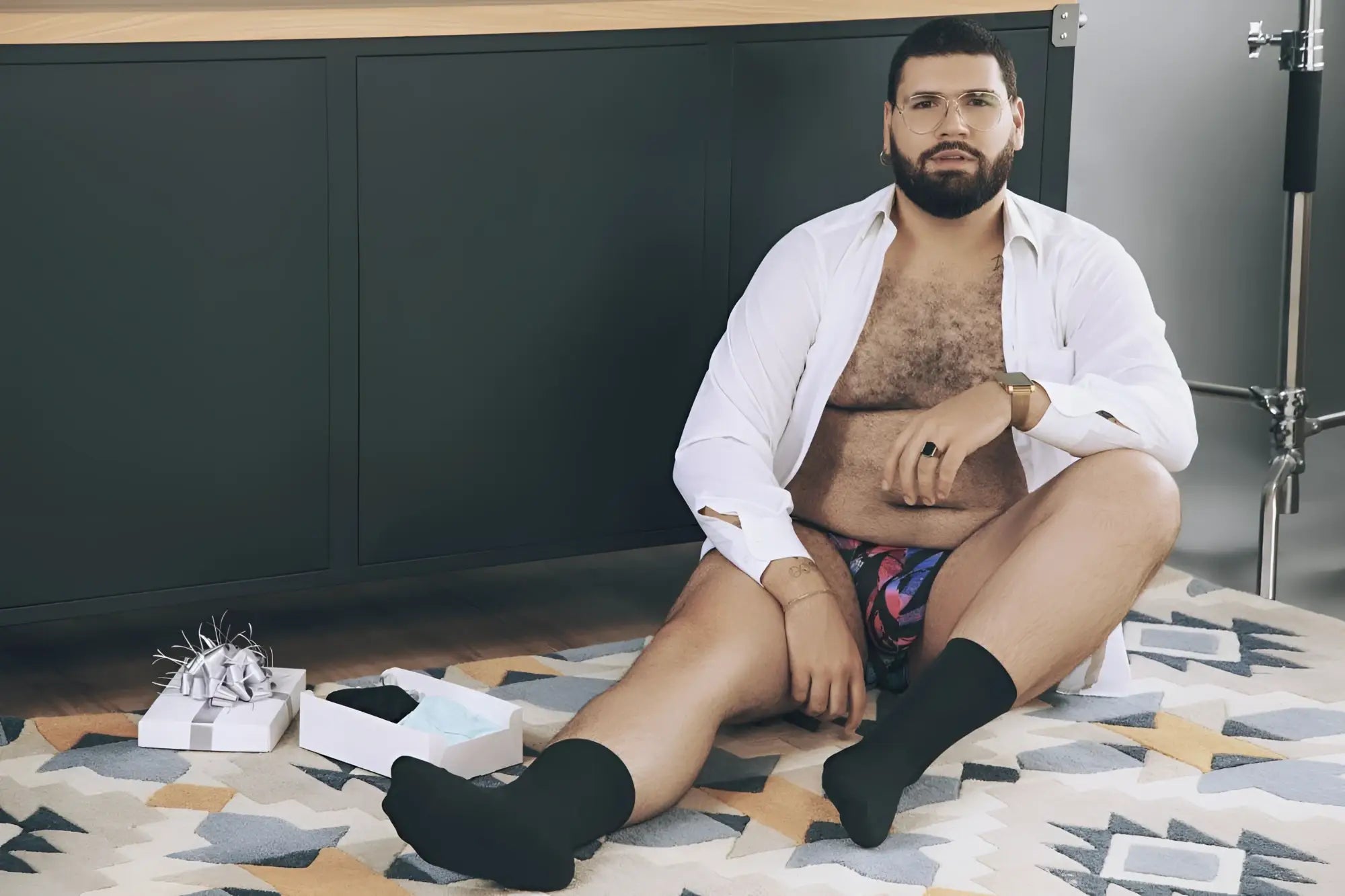 Man wearing black socks modeling pikante pik 0989x jartum briefs in black showing front view