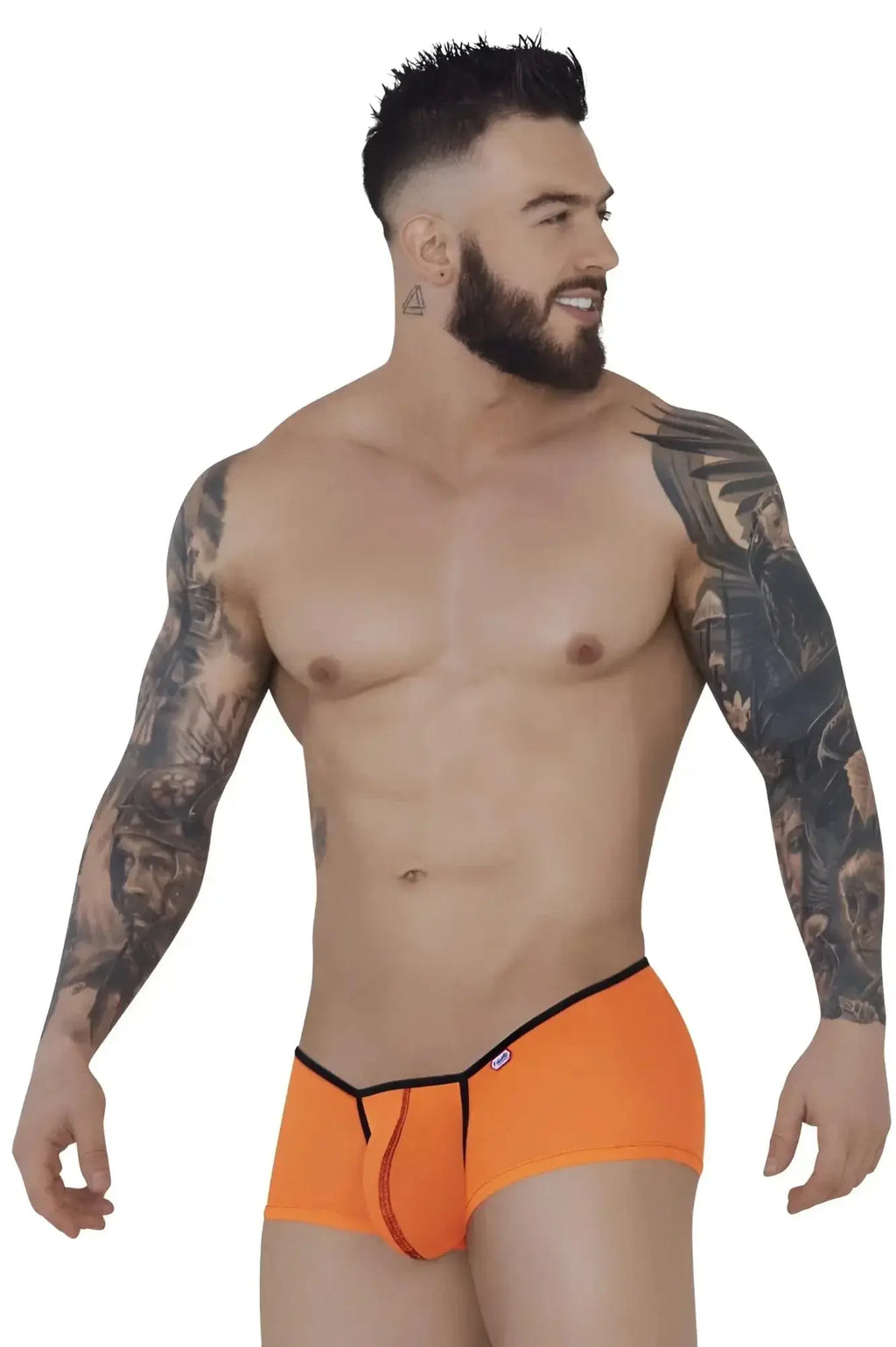 Front view of a model wearing orange Pikante PIK 1273 Sonar trunks.