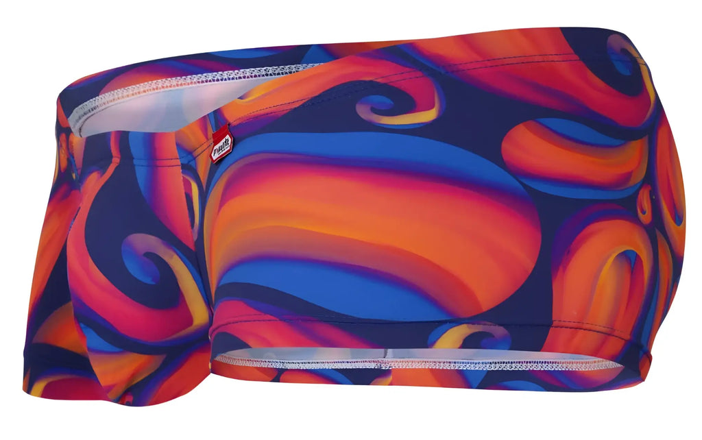 Vibrant pikante pik 1826 kracent swim trunks in bold orange blue and purple with abstract swirl patterns and elastic waistband