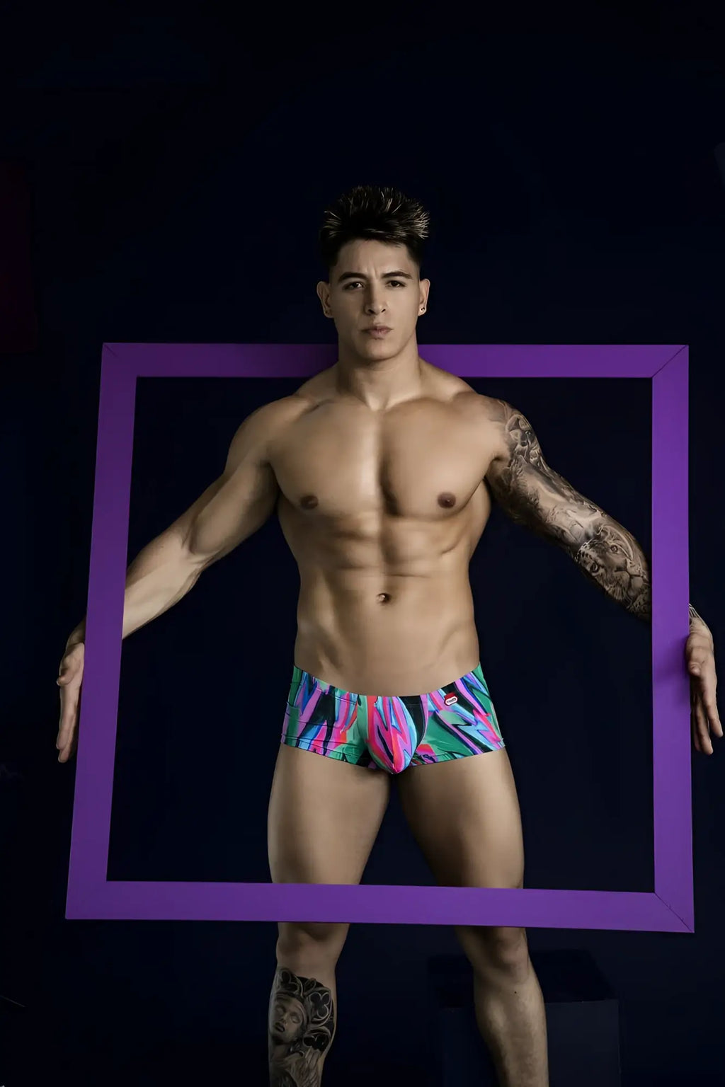 Vibrant multicolored pikante PIK 1828 abstract trunks in green with bold tropical pattern for swimwear use