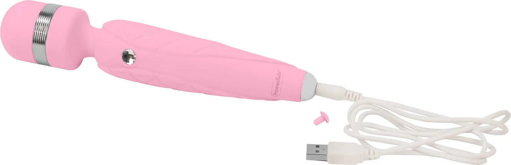 Pink silicone wand with silver metallic band and usb charging cable from pillow talk cheeky pink product line