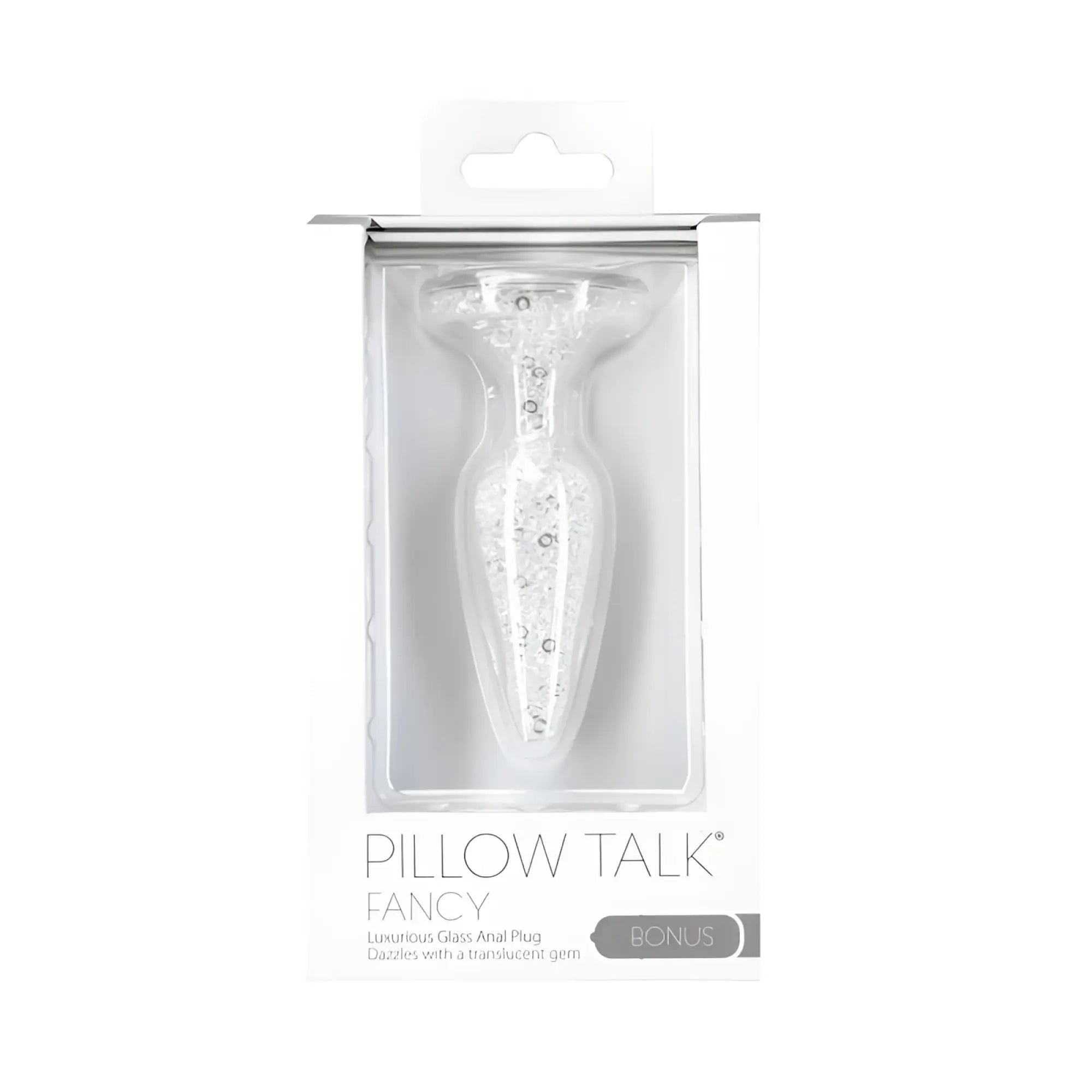 A clear glass anal plug with translucent gemstones in white box labeled pillow talk fancy for luxurious use