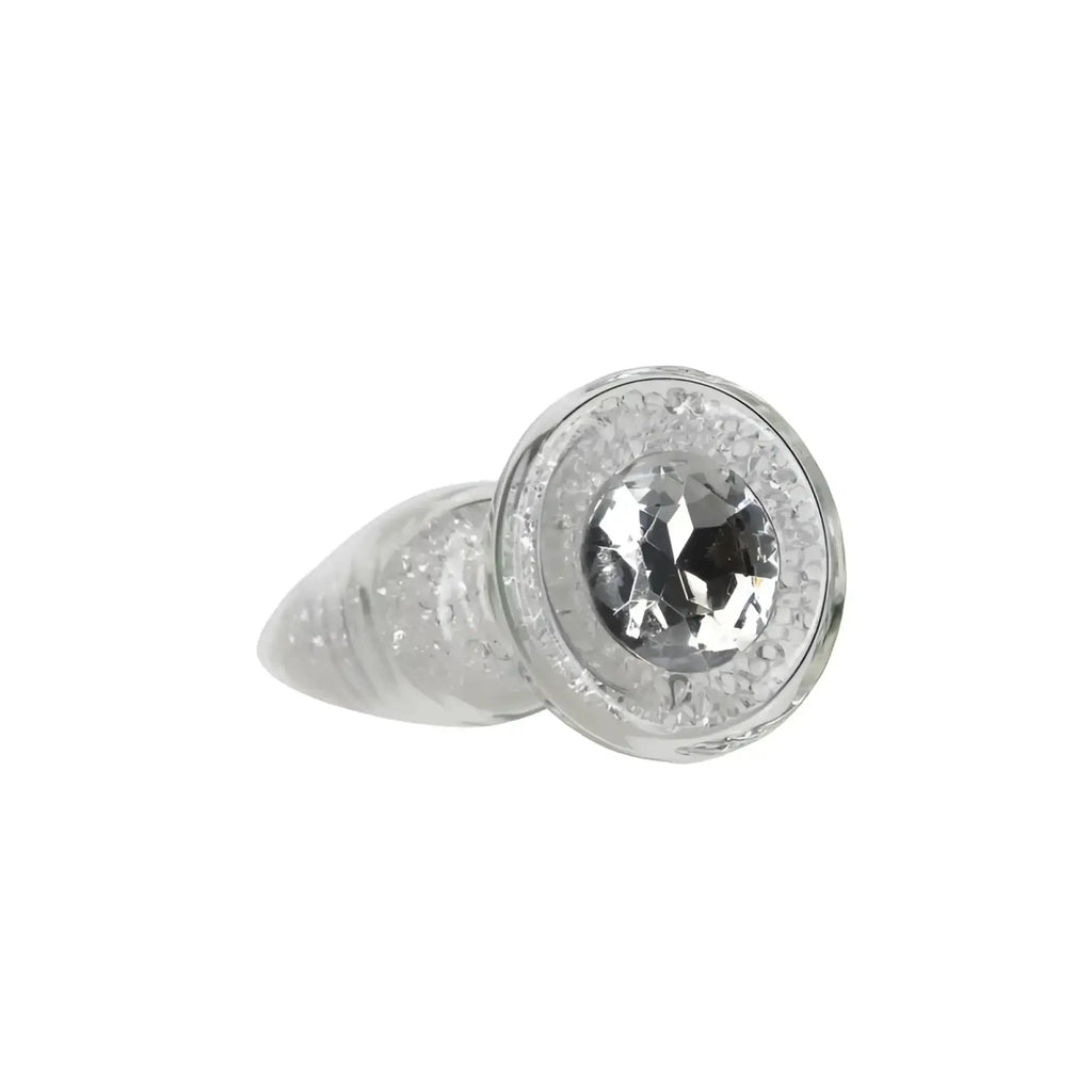 Silver-toned pillow talk fancy luxurious glass anal plug with central faceted crystal and halo of clear crystals