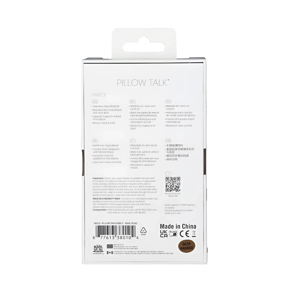 White cardboard packaging for pillow talk fancy luxurious glass anal plug with clear gem displayed on front side