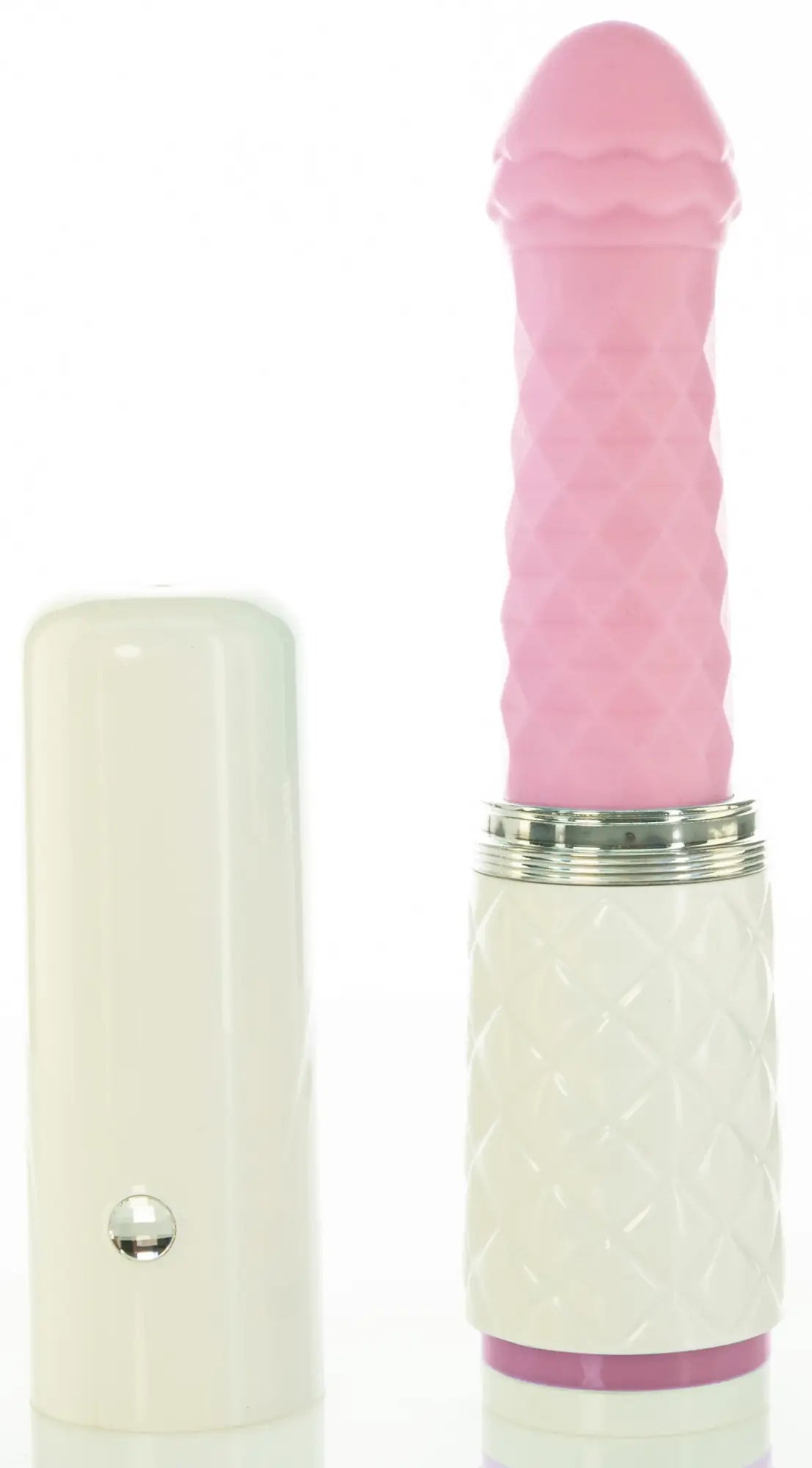 Pillow talk feisty pink vibrator with pink textured silicone tip, white diamond-patterned body, silver band, and purple ring