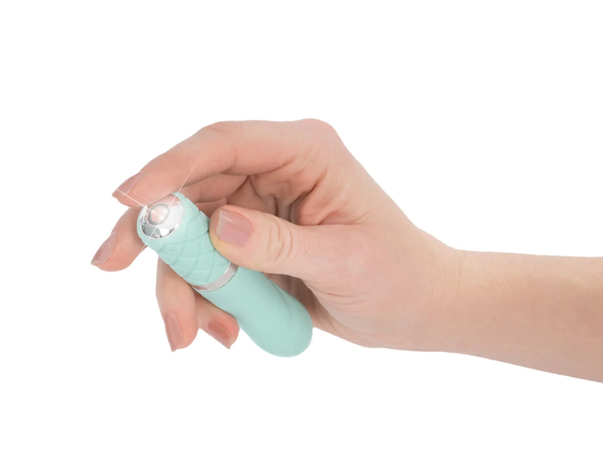 A mint green pillow talk flirty teal ergonomic handheld device with a silver metallic tip and textured grip