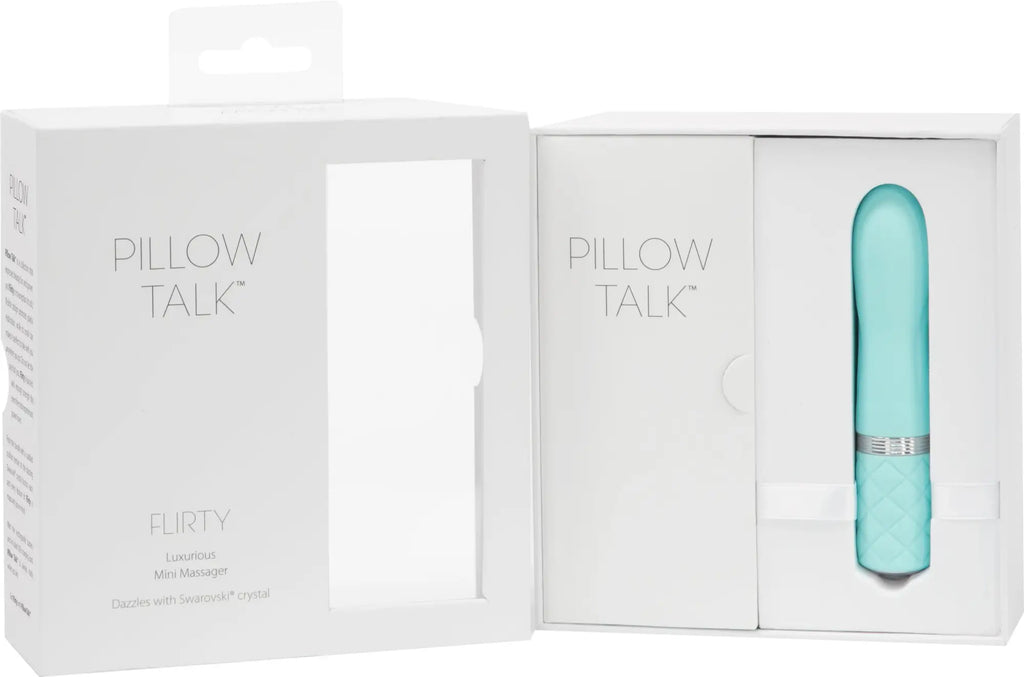 A sleek light blue pillow talk flirty mini massager with a silver accent band for personal relaxation